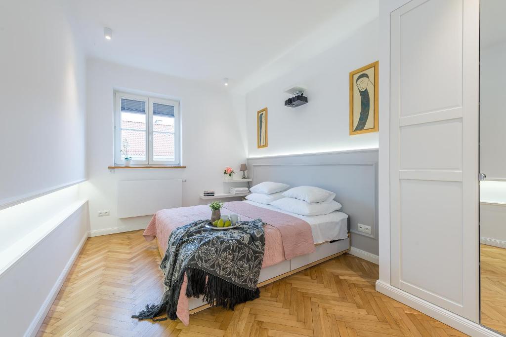 Posteľ alebo postele v izbe v ubytovaní P&O Apartments Old Town