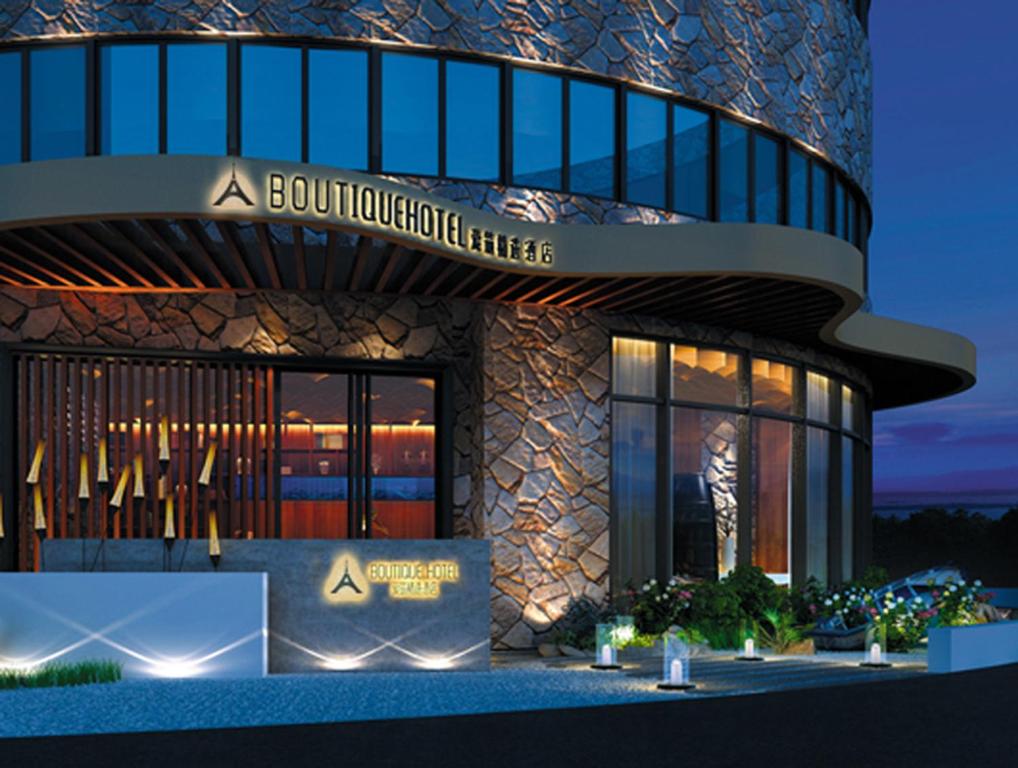 eine architektonische Darstellung der Vorderseite eines Gebäudes in der Unterkunft Aizhu Boutique Theme Hotel in Xiamen