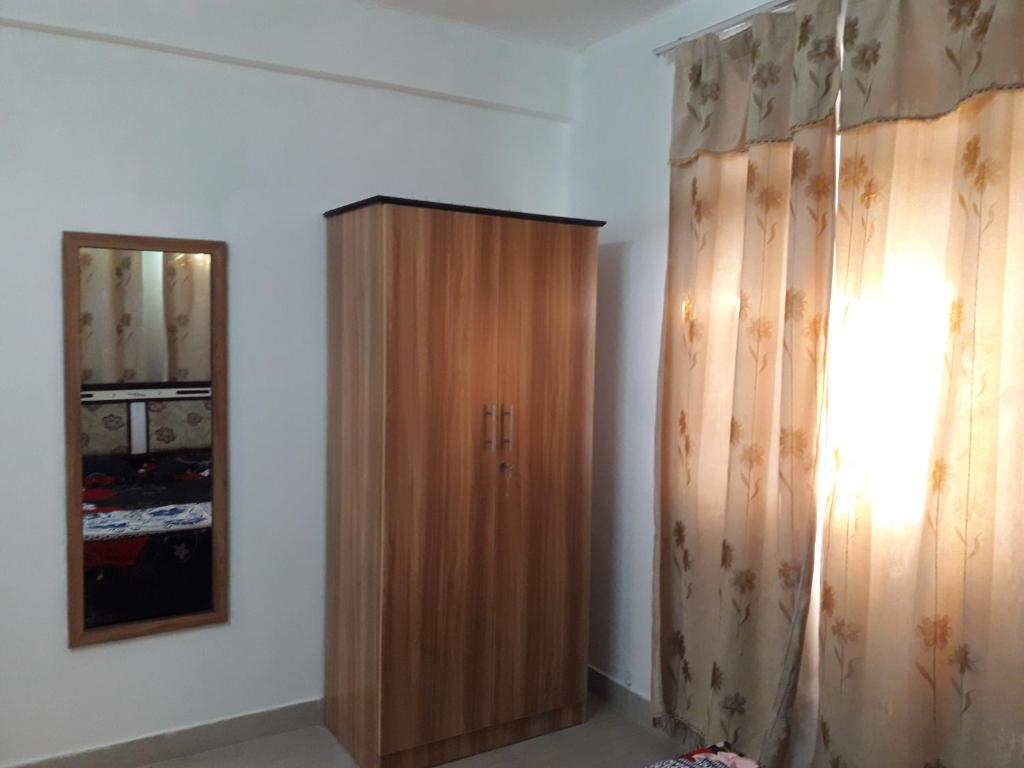 Bano Tourist Residence - 650 meters from Grand Bay Beach - Apartamento De Dos Dormitorios