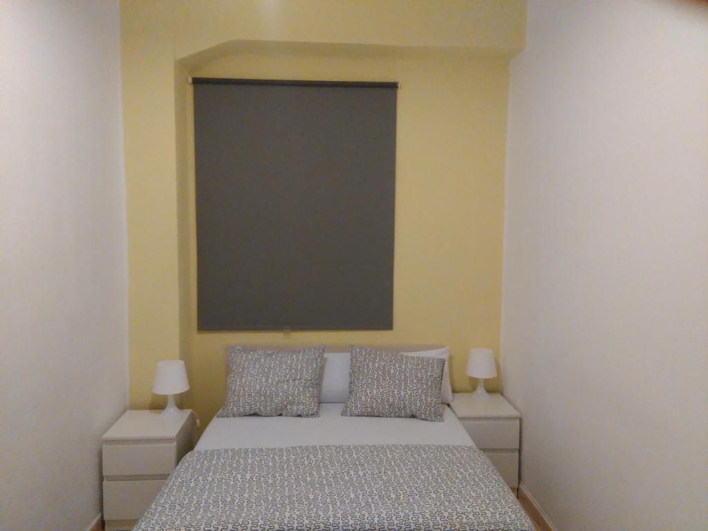 Posteľ alebo postele v izbe v ubytovaní Apartamento Ciudad de las Ciencias