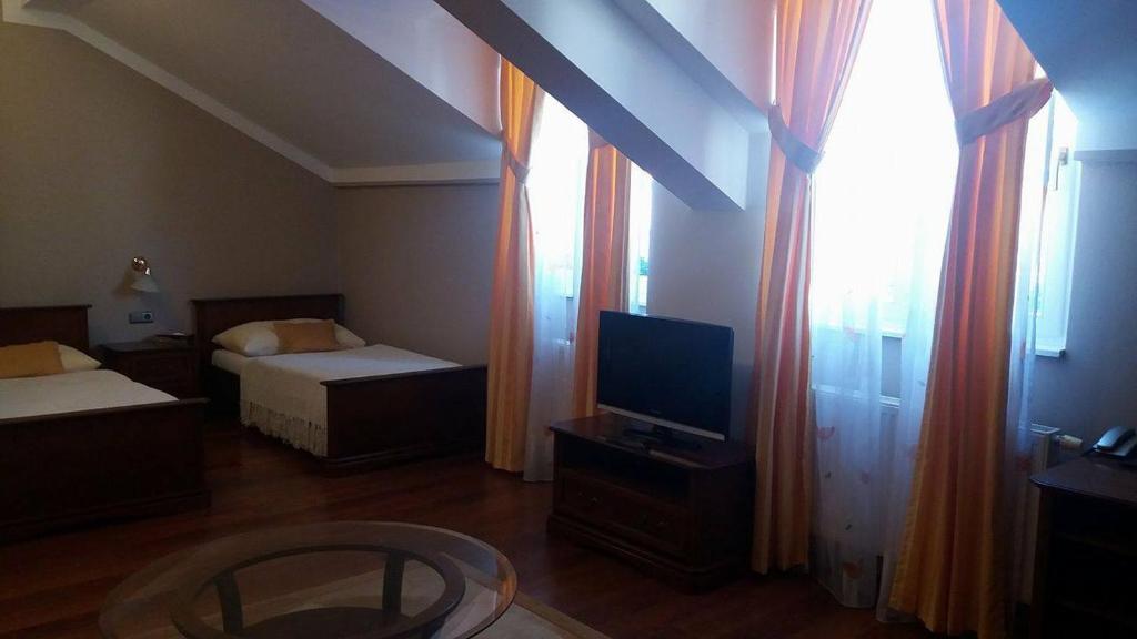 Posteľ alebo postele v izbe v ubytovaní Boutique Hotel Carpe Diem