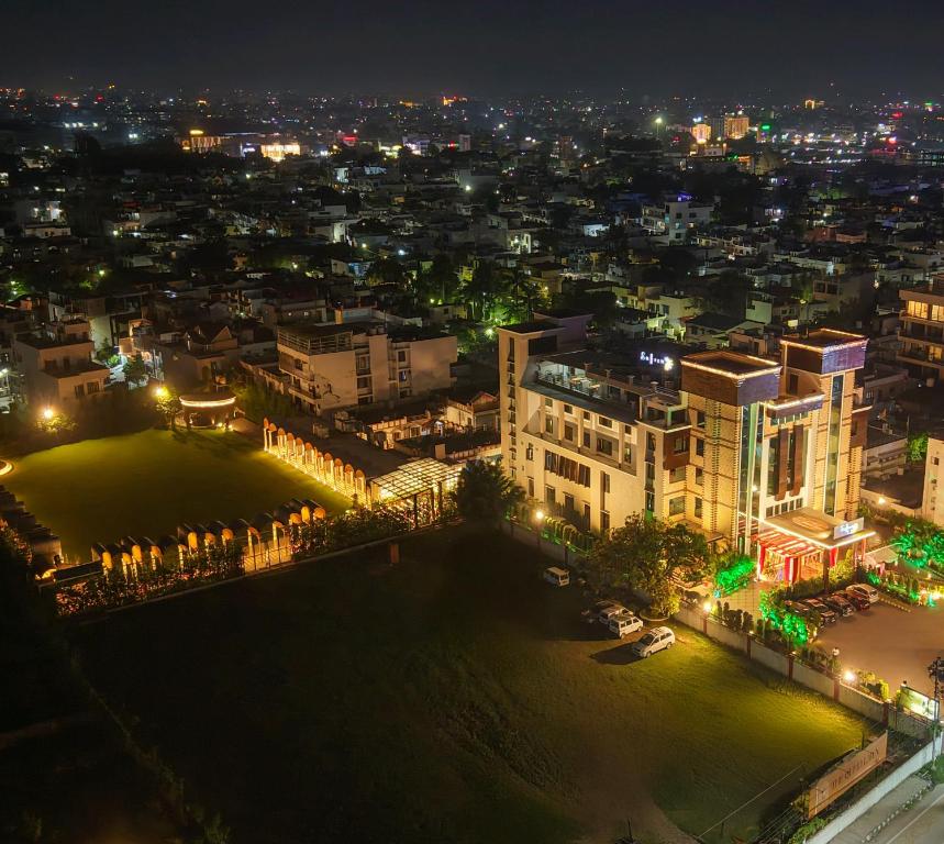 a view of a city at night with a park at Hotel Saffron Leaf in Dehradun