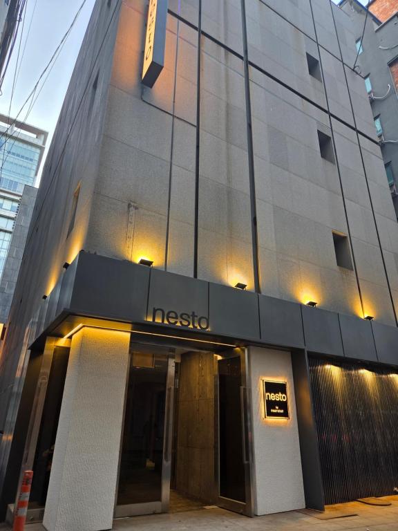 a msg building with a sign on the front of it at Nesto Hongdae in Seoul