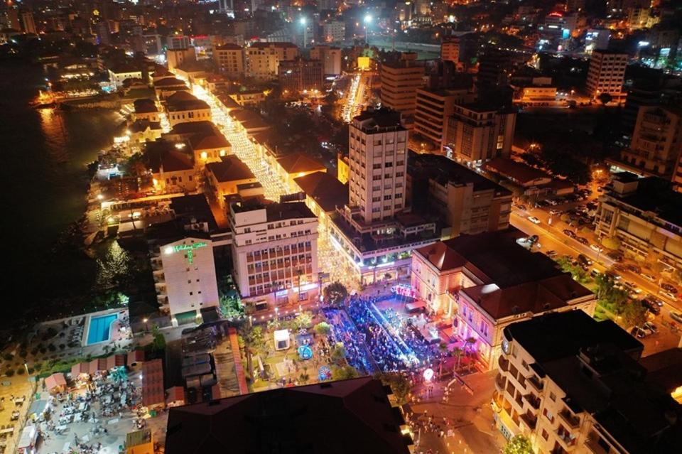 an overhead view of a city at night at Holiday Suites Hotel & Beach Resort in Jounieh