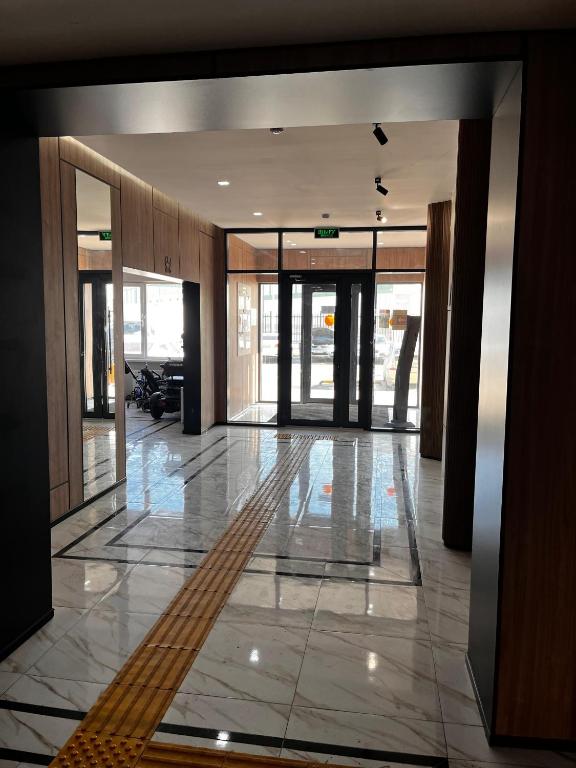 لابی و فضای عمومی Auezov City Comfort Apt - تصویر ۵