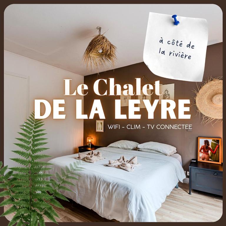 a poster of a bedroom with a bed in a room at Le Chalet de la Leyre in Le Teich