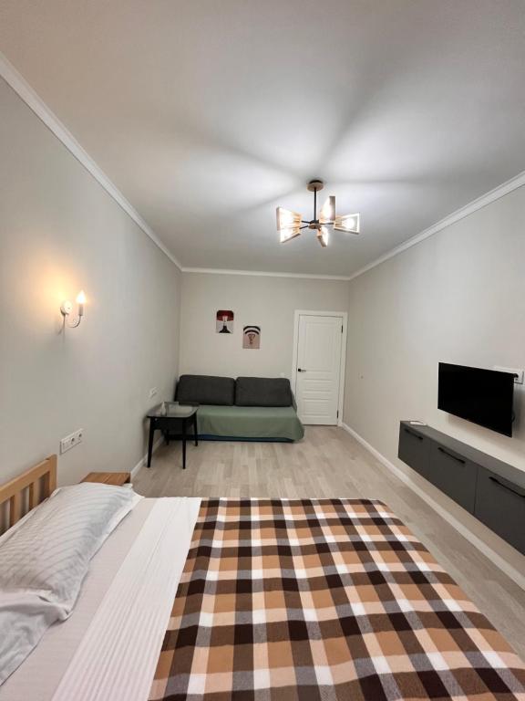 فضای داخلی Cozy Modern Akvarel Apt در آلماتی - تصویر ۳