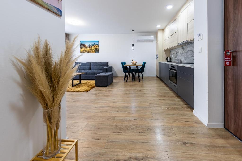 a living room with a couch and a table at Hotel MM Residence in Mostar