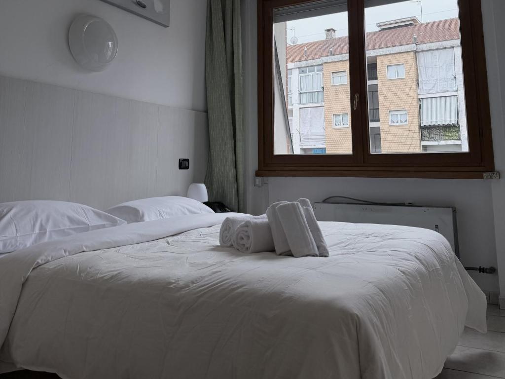 Lova arba lovos apgyvendinimo įstaigoje Hotel Giada
