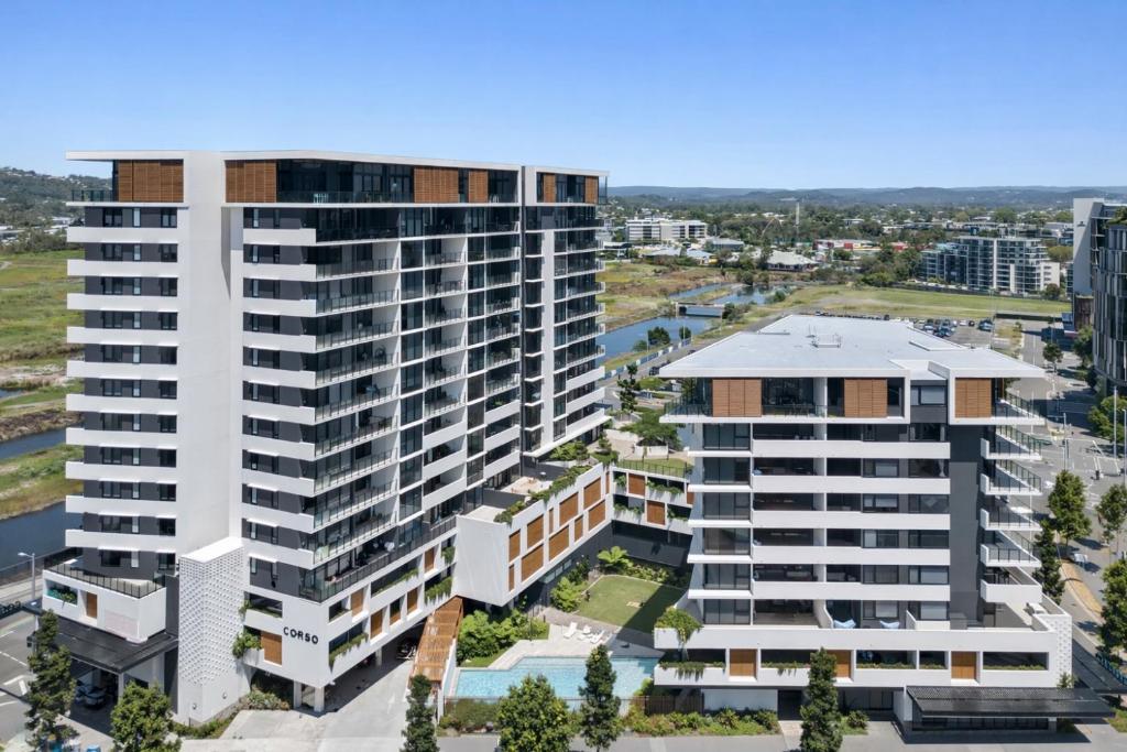 an aerial view of a large white building at Alcyone at The Corso in Maroochydore