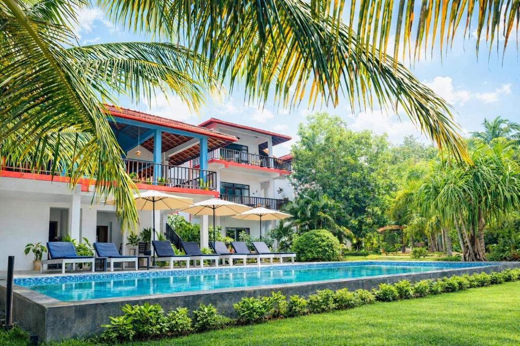 an image of a villa with a swimming pool at Ashansa Lagoon Resort in Tangalle