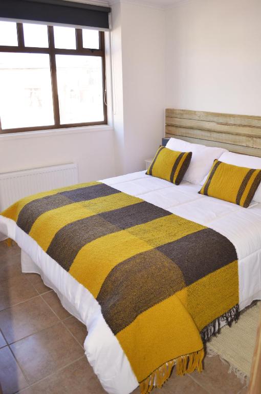 Postel nebo postele na pokoji v ubytování Apart Hotel Endurance