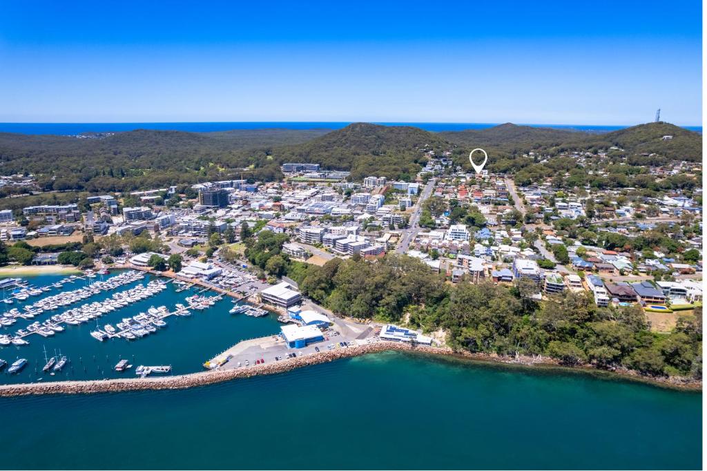 an aerial view of a harbor with boats in the water at The Nelson Bay Getaway in Nelson Bay