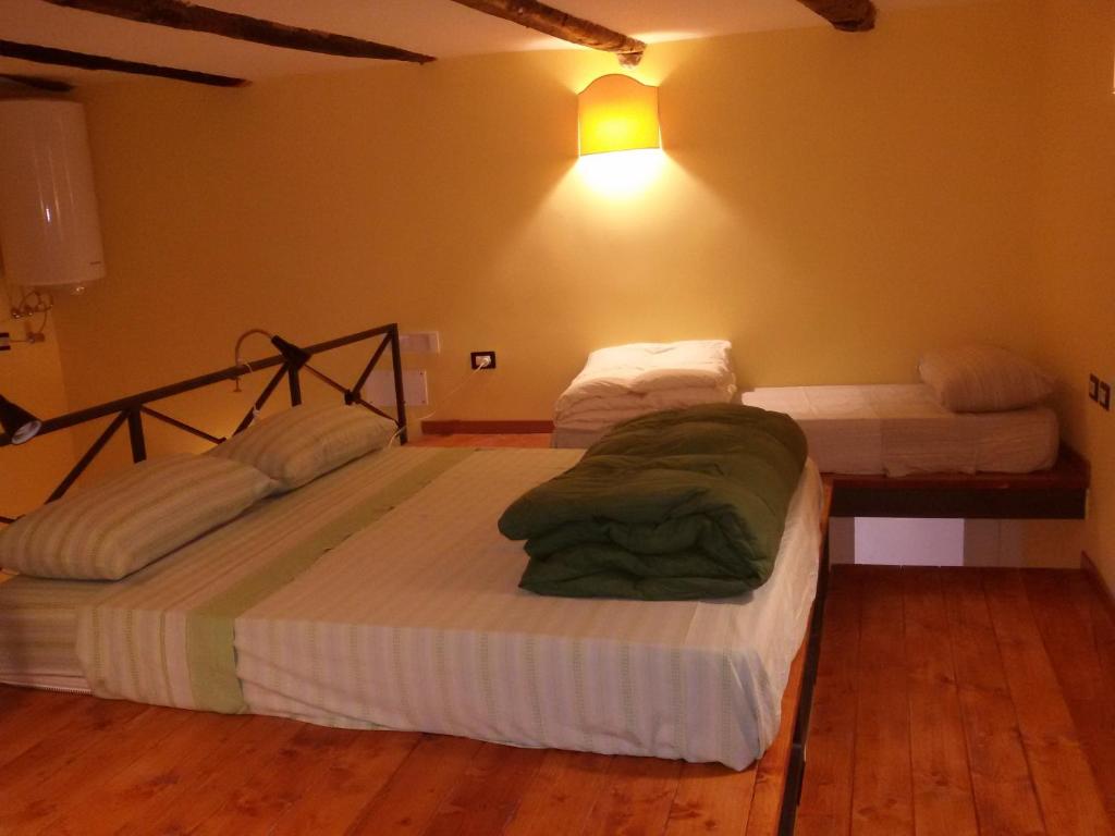 Posteľ alebo postele v izbe v ubytovaní Guide Tour Apartments