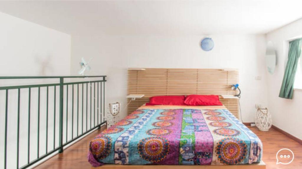 Ліжко або ліжка в номері Napoli sotterranea apartment
