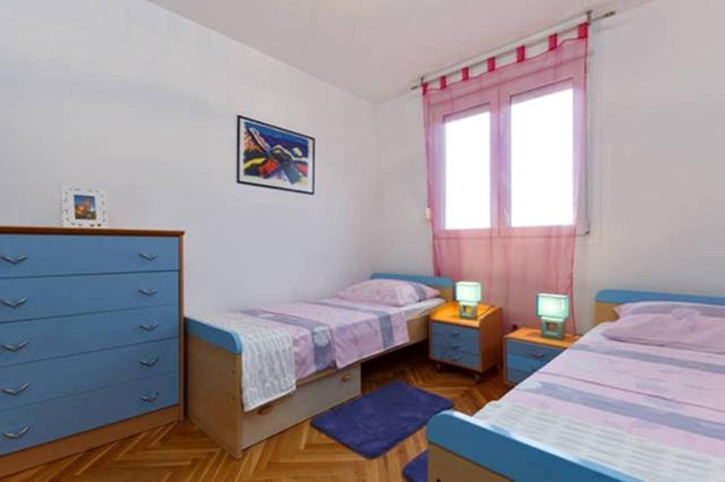 Posteľ alebo postele v izbe v ubytovaní Luxurious Apartment Majda, 2 bathrooms and free parking