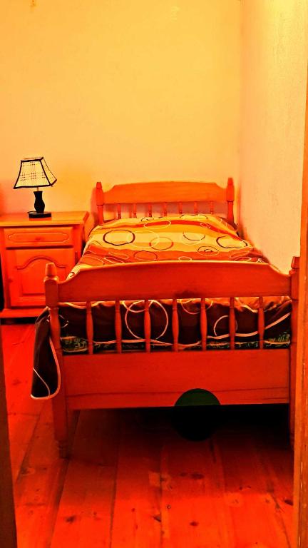 Llit o llits en una habitació de Archil and Nino Gigauri Guest House