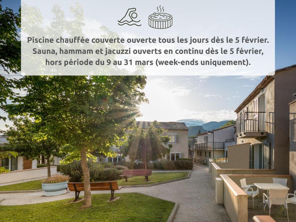 a picture of a courtyard with benches and tables at Garden & City Mont-Ventoux Malaucène in Malaucène