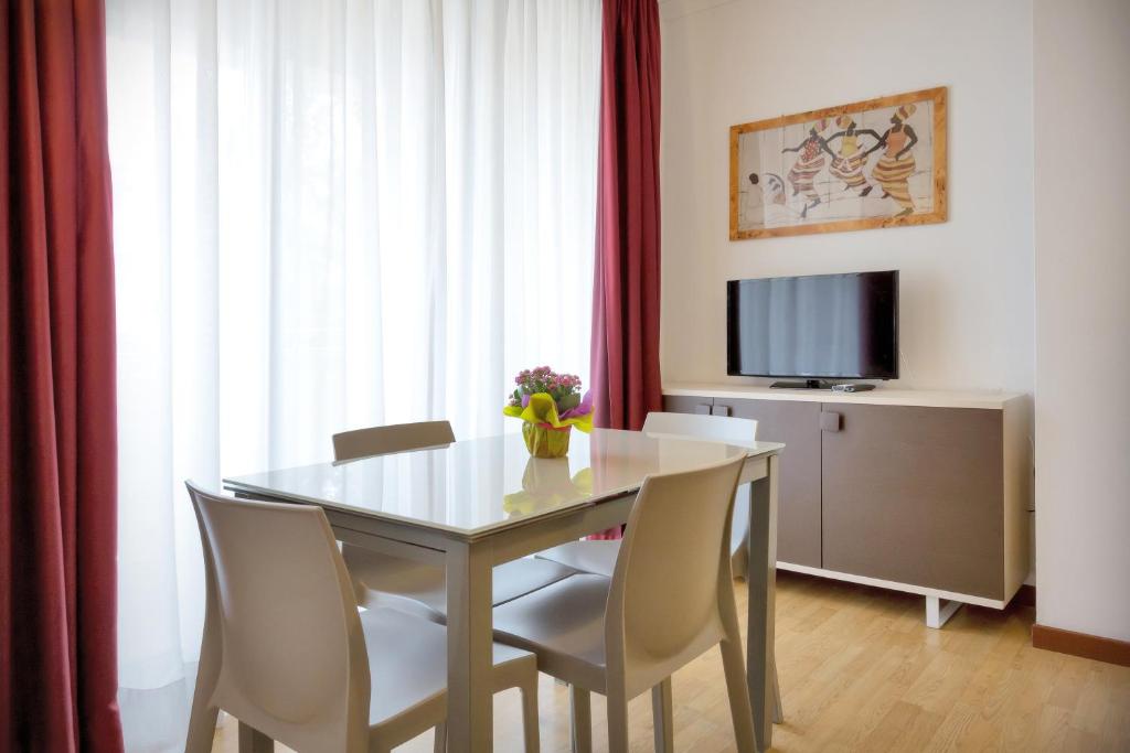 TV a/nebo společenská místnost v ubytování Hotel Palladio