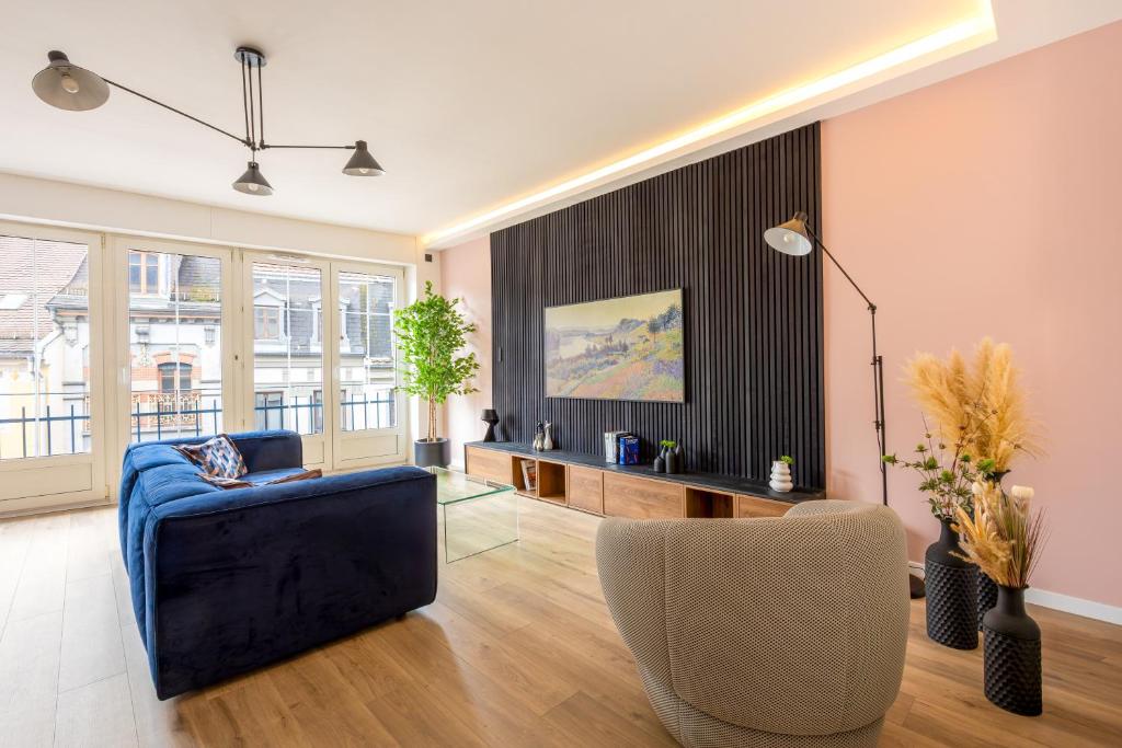 a living room with a couch and a chair at Slate at Max, Luxury in Mulhouse, Air Conditionné in Mulhouse