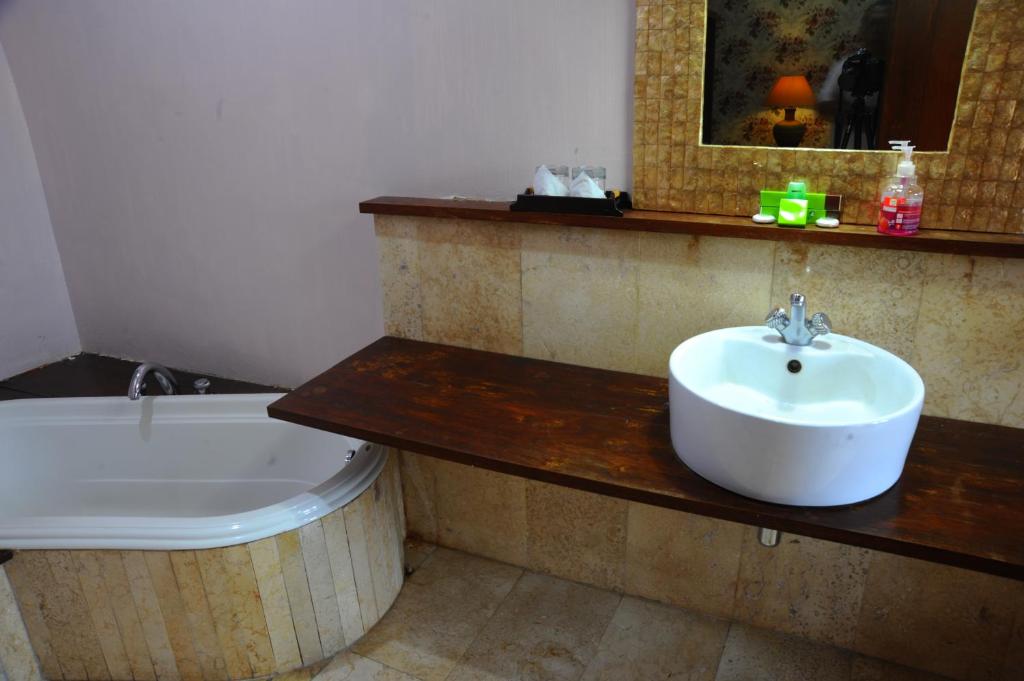 Koupelna v ubytování Tegal Panggung Guest House