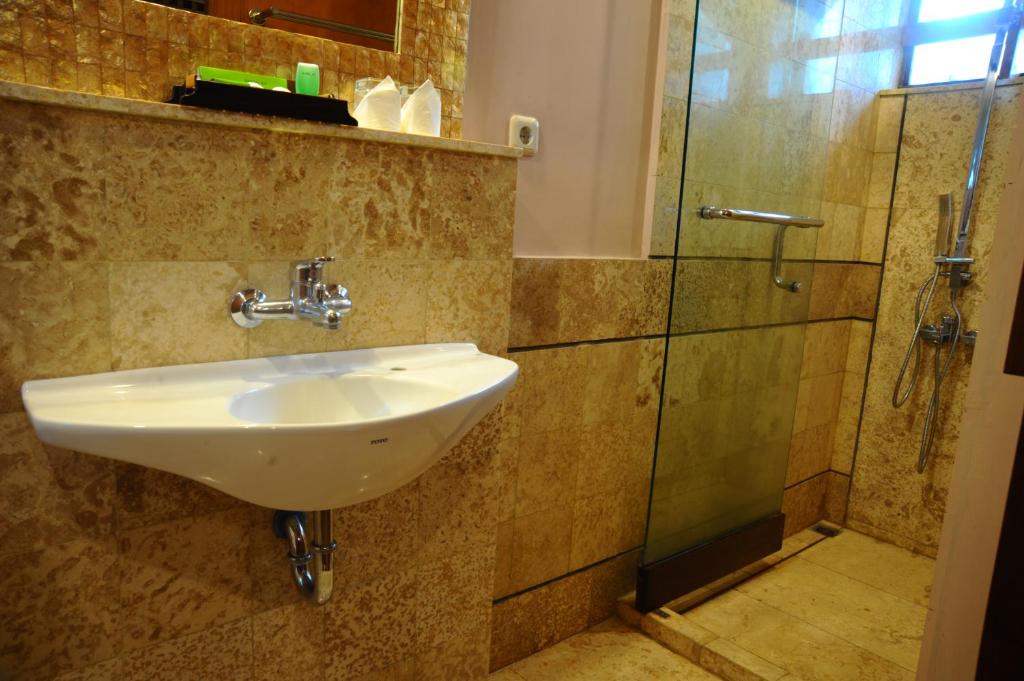 Koupelna v ubytování Tegal Panggung Guest House