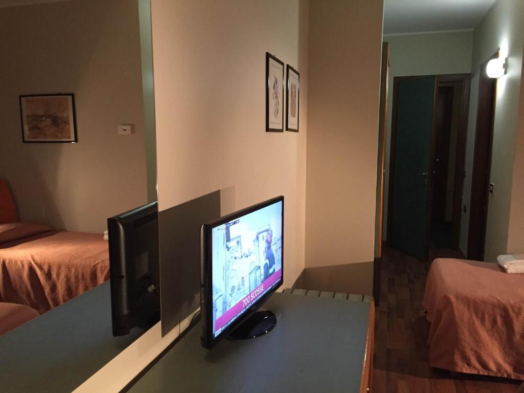 TV a/nebo společenská místnost v ubytování Orzihotel
