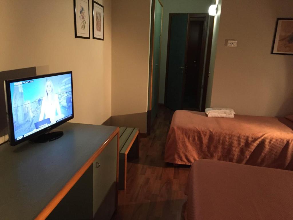 TV a/nebo společenská místnost v ubytování Orzihotel