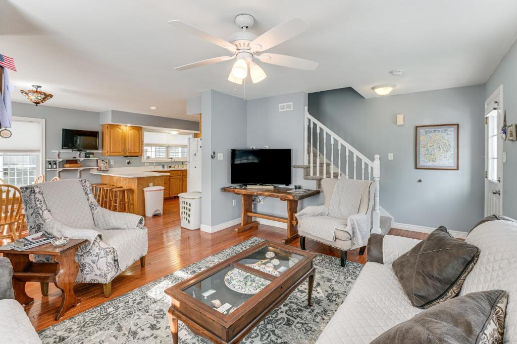a living room with a couch and a table at Shop, Dine, Unwind! Family Home in Dtwn Bar Harbor in Bar Harbor