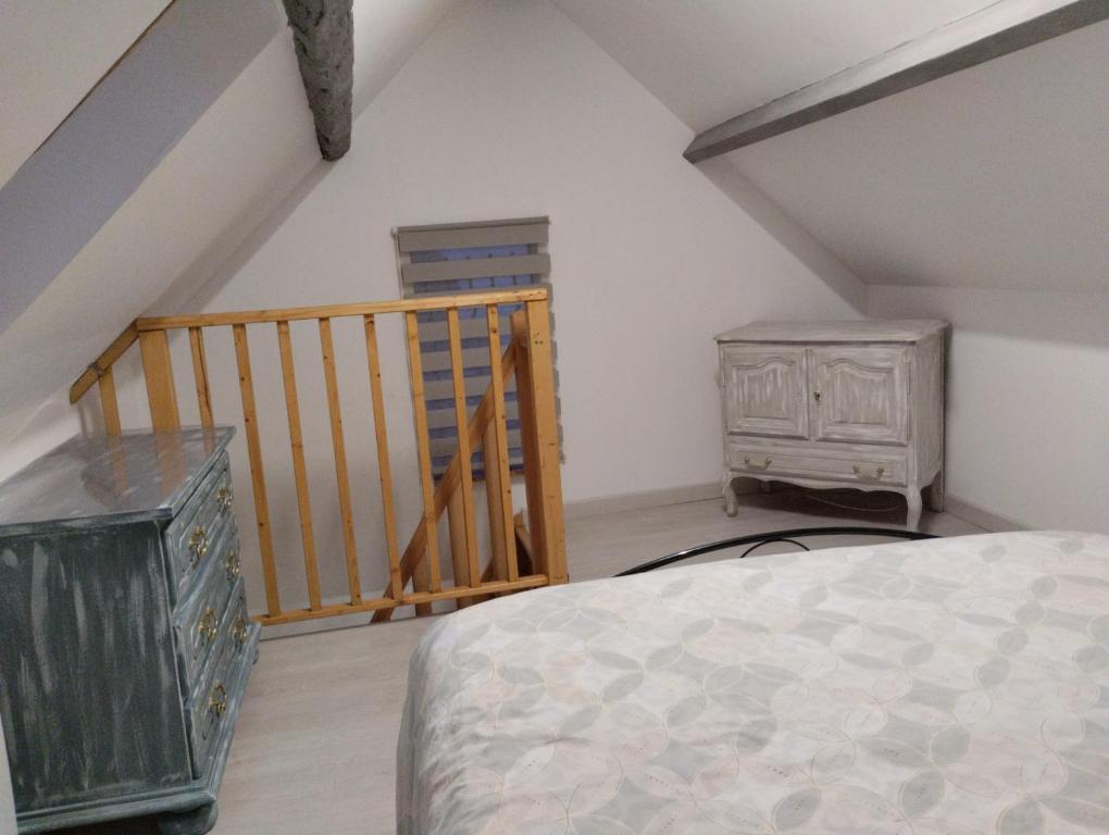 En eller flere senger på et rom på Maisonnette