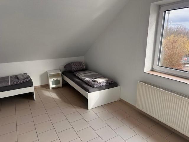 4 Personen I 2 Schlafzimmer I Wohnung Wörrstadt mit Parkplatz