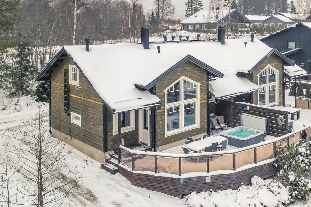 an aerial view of a house in the snow at Villa Peso 2 Incl WiFi, AC and Jacuzzi for extra fee in Himos