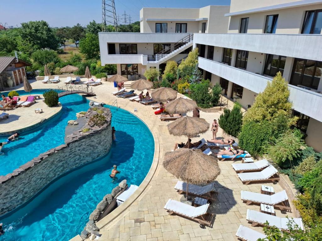 an image of a hotel with a swimming pool and a resort at Complex Casa Ani in Eforie Nord