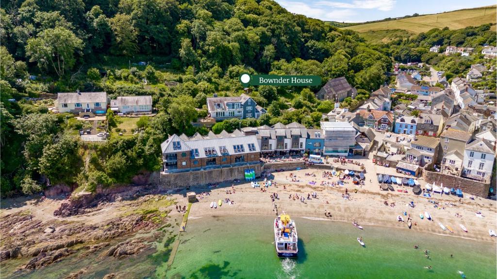 an aerial view of a beach with a boat in the water at Finest Retreats - Bownder House in Cawsand