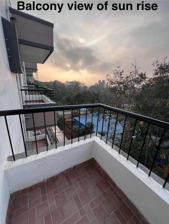 a balcony view of sun rise from a house at shankara stays in Bangalore