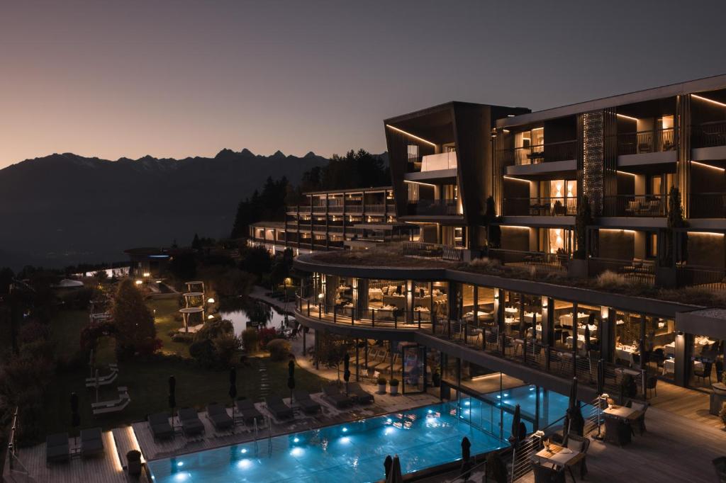 an aerial view of a hotel at night at Chalet Mirabell in Avelengo