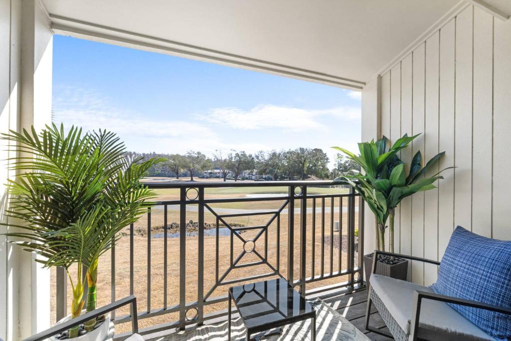 a balcony with a view of the ocean at Golf Coast Bleu Studio - 3160 in Zephyrhills