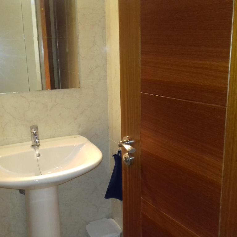 A bathroom at Apartamento Sunset