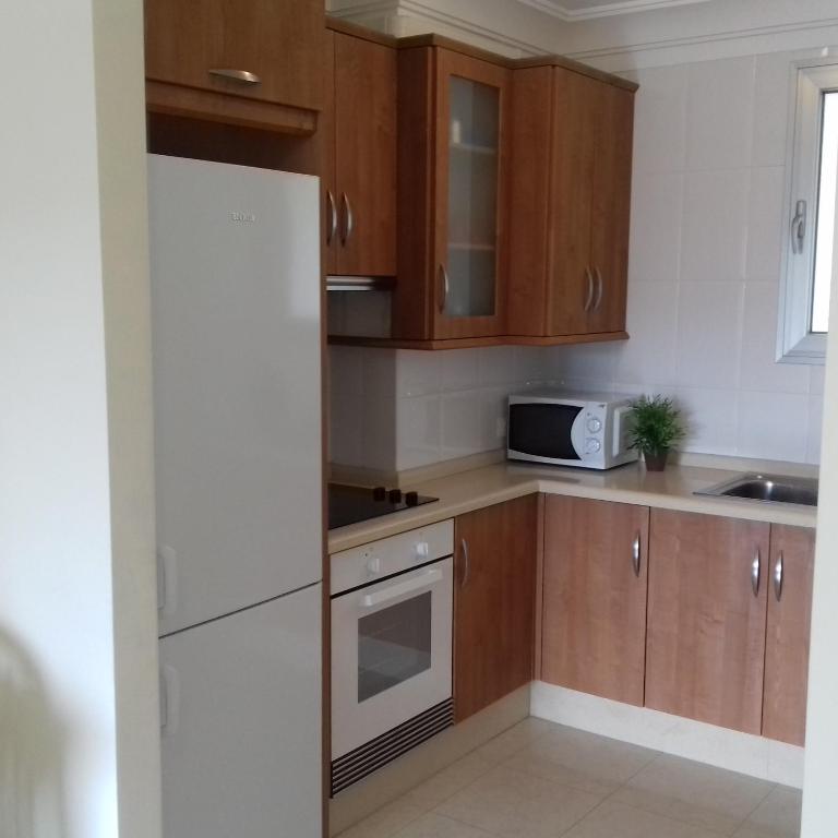 A kitchen or kitchenette at Apartamento Sunset