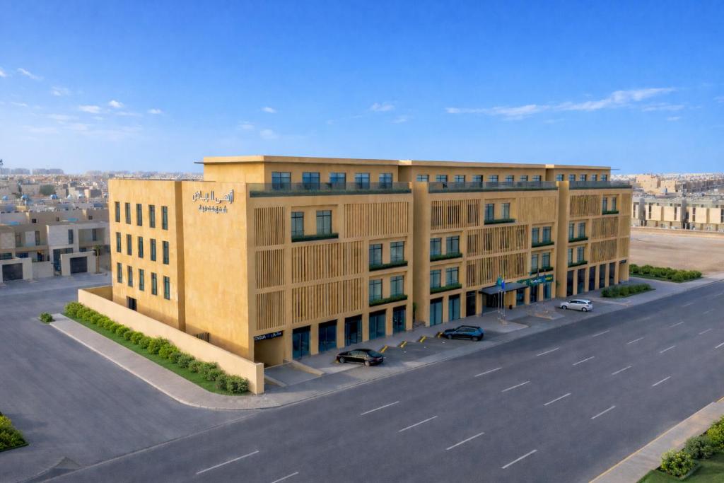 an overhead view of a building with a parking lot at Azha Alriyadh in Riyadh