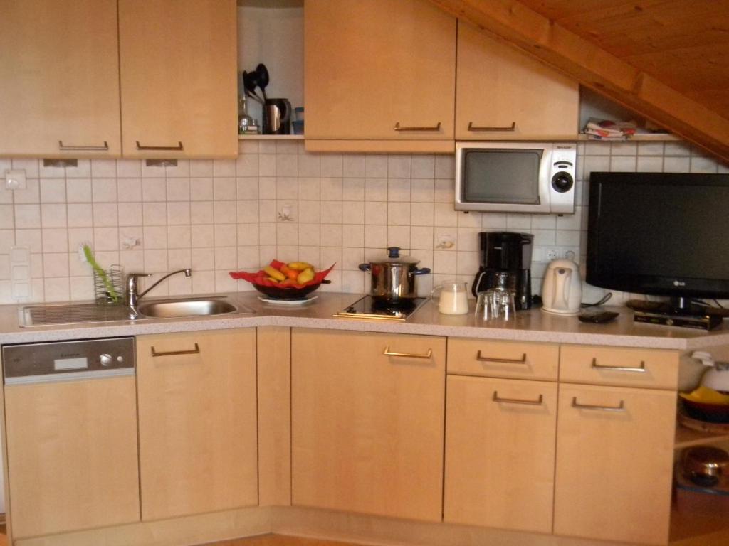 Kuchyň nebo kuchyňský kout v ubytování Unterweger Hof