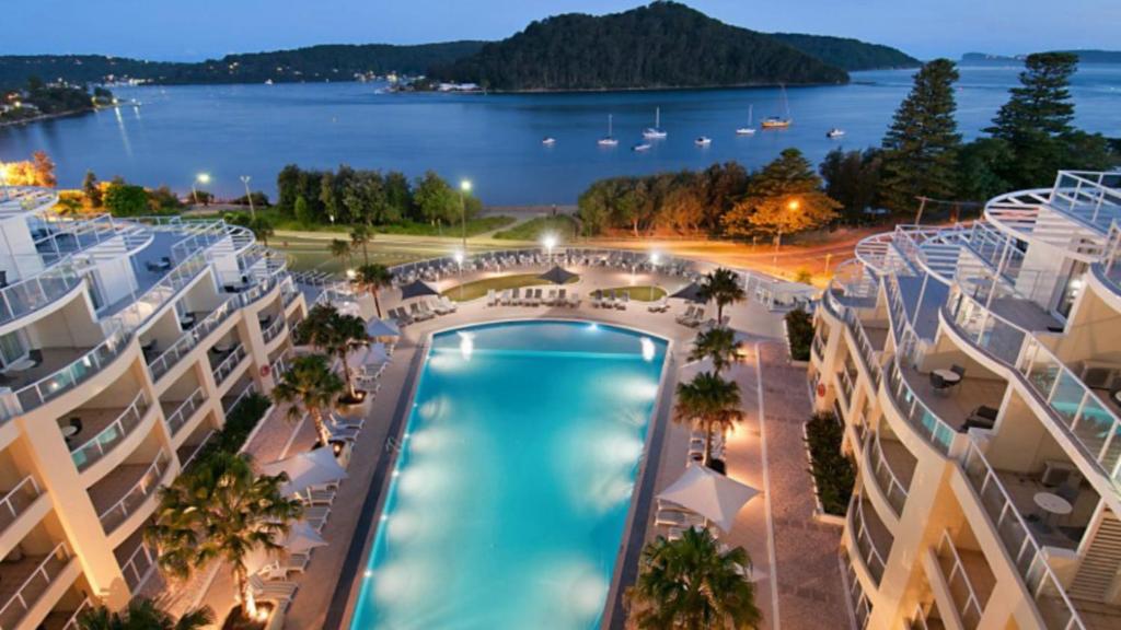 an aerial view of a resort with a swimming pool at Breathtaking - Ettalong Beach Resort in Ettalong Beach