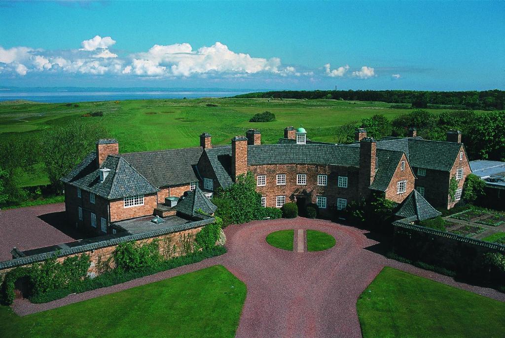 an aerial view of a large house with a large yard at Greywalls Hotel & Chez Roux in Gullane