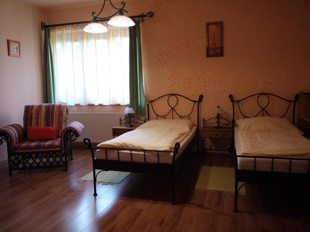 Postel nebo postele na pokoji v ubytování Apartmány PEMI Potštejn