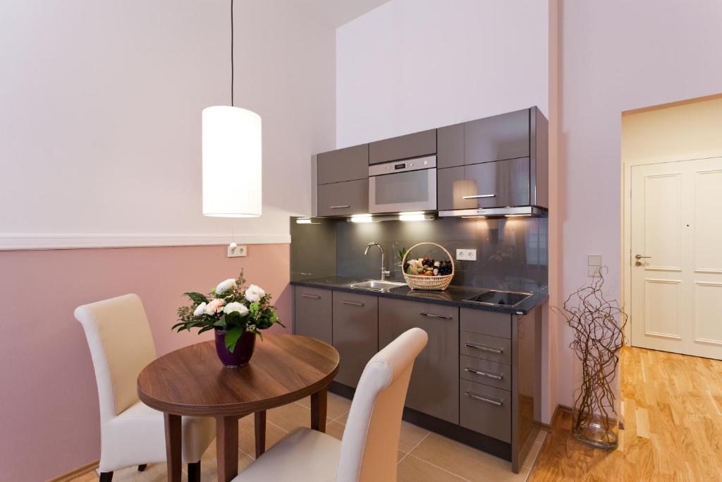 Aparthotel Am Schloss - Resim 5