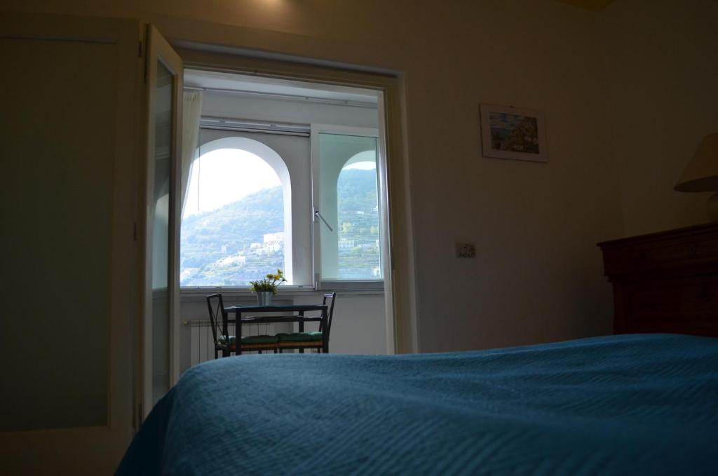 A bed or beds in a room at Casa Cecilia