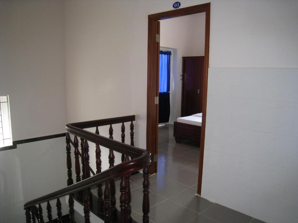 Postel nebo postele na pokoji v ubytování Hoa Sua Motel