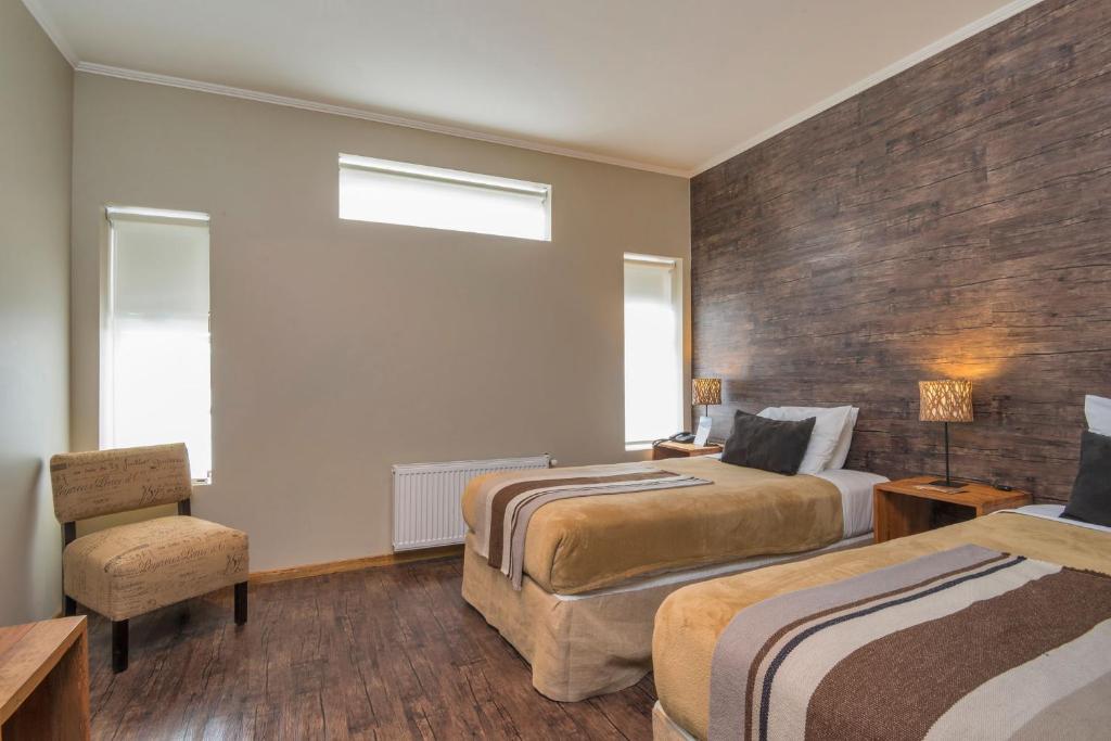 Postel nebo postele na pokoji v ubytování Hotel Alto Nevados