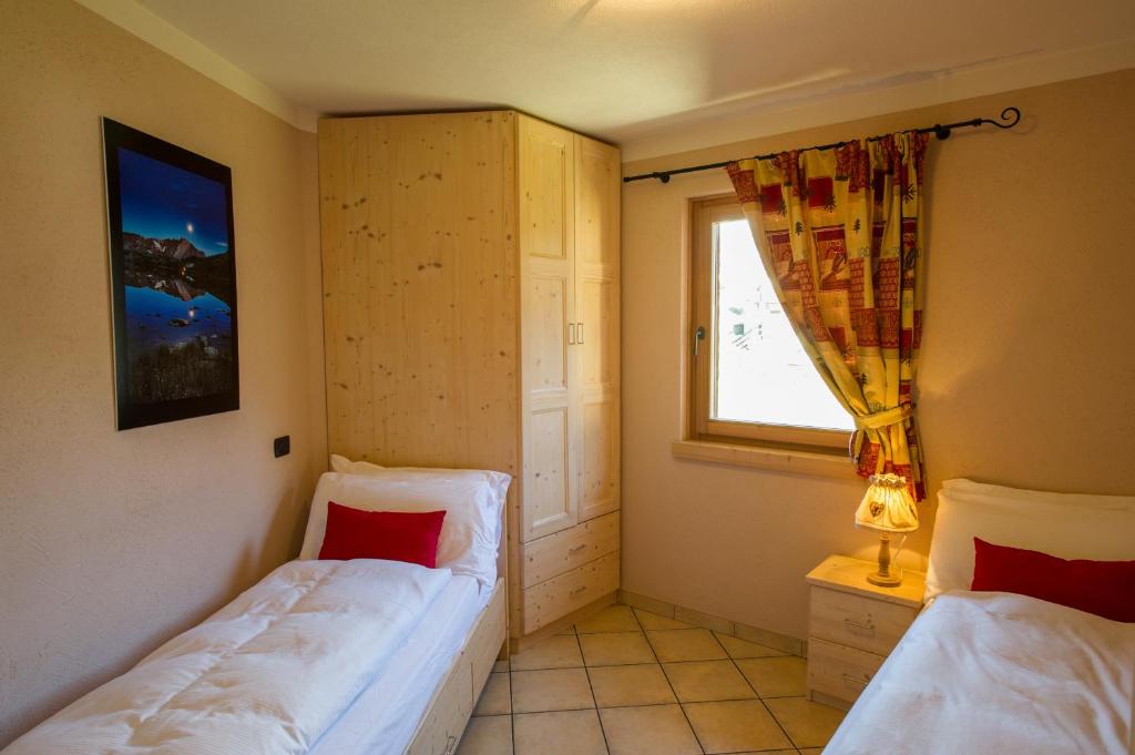 Postel nebo postele na pokoji v ubytování Chalet La Rugiada