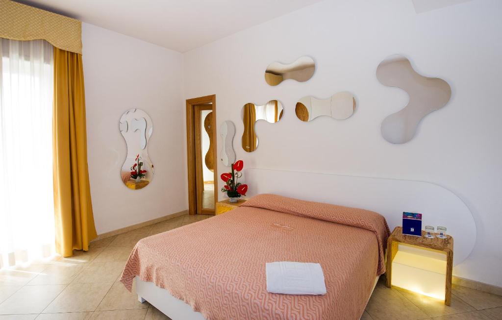 Postel nebo postele na pokoji v ubytování Joli Park Hotel - Caroli Hotels